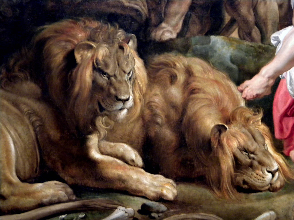 Who was thrown into a den of lions?