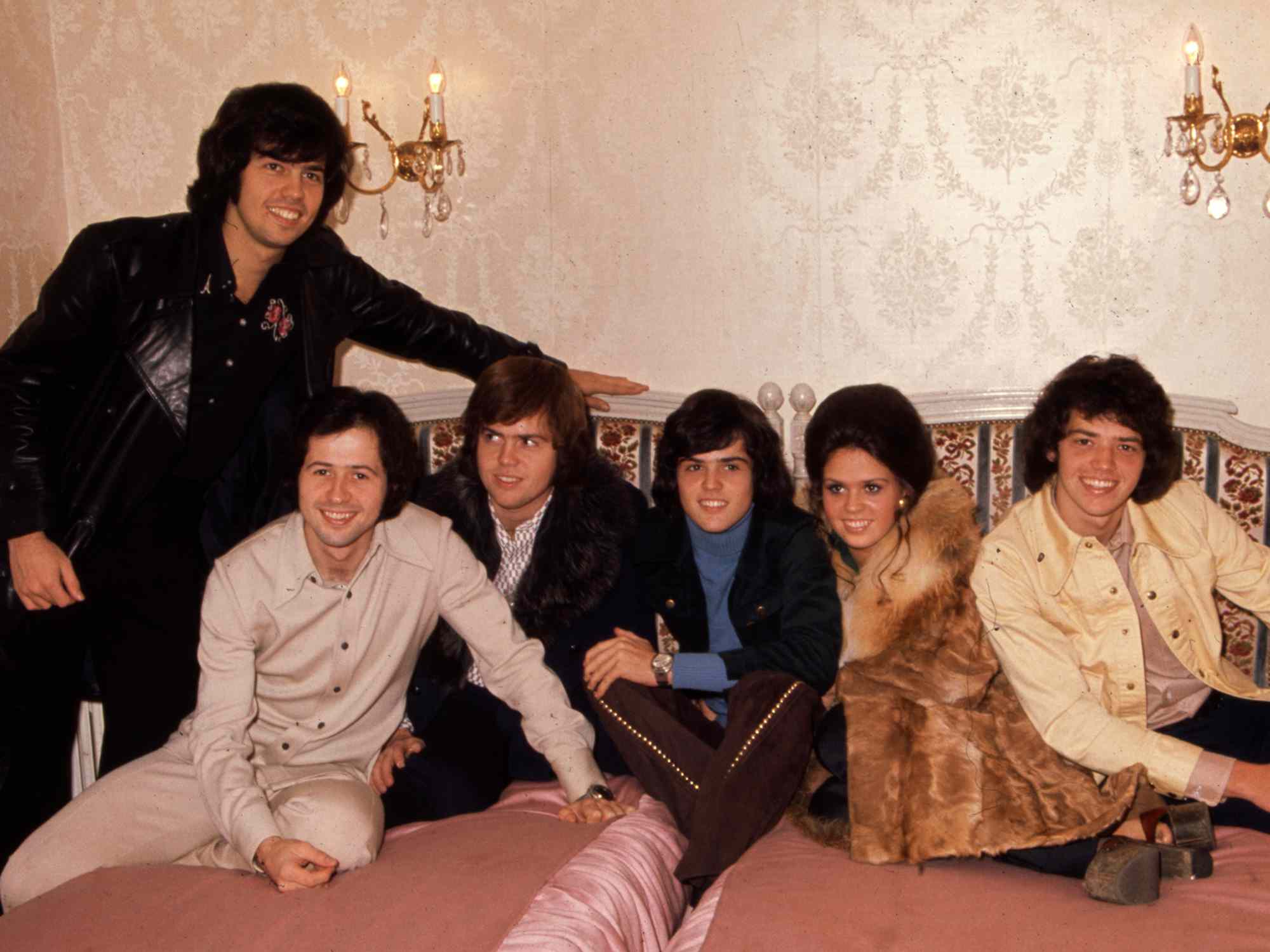 Alan, Wayne, Merrill, Jay, Donny, Jimmy, and Marie Osmond
