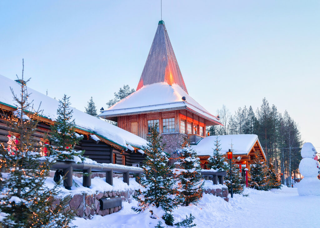 Santa Office and Christmas trees in Santa Claus Village, Rovaniemi, Lapland, Finland, on Arctic Circle in winter.