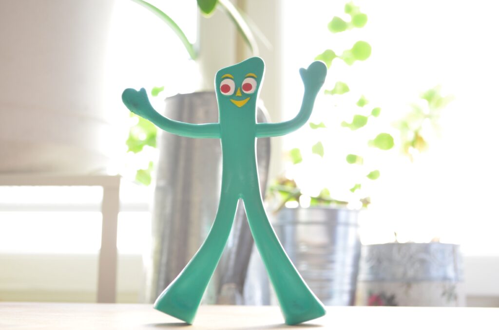 gumby vintage toy near window