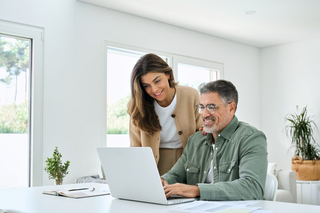 Older couple using a laptop together