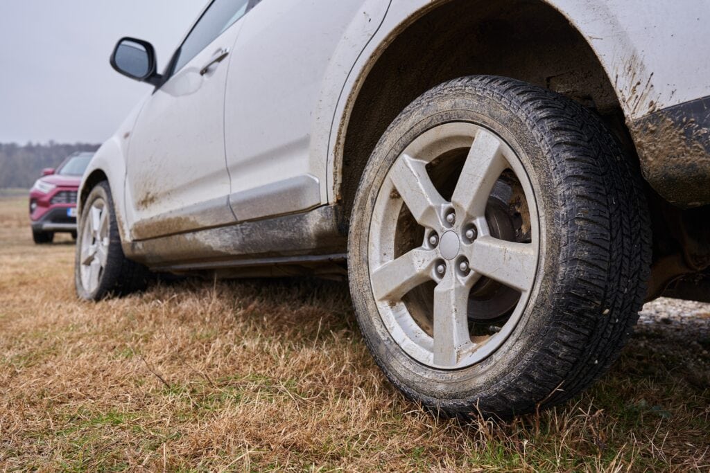 Off road SUV car crashed into a ditch on a track course