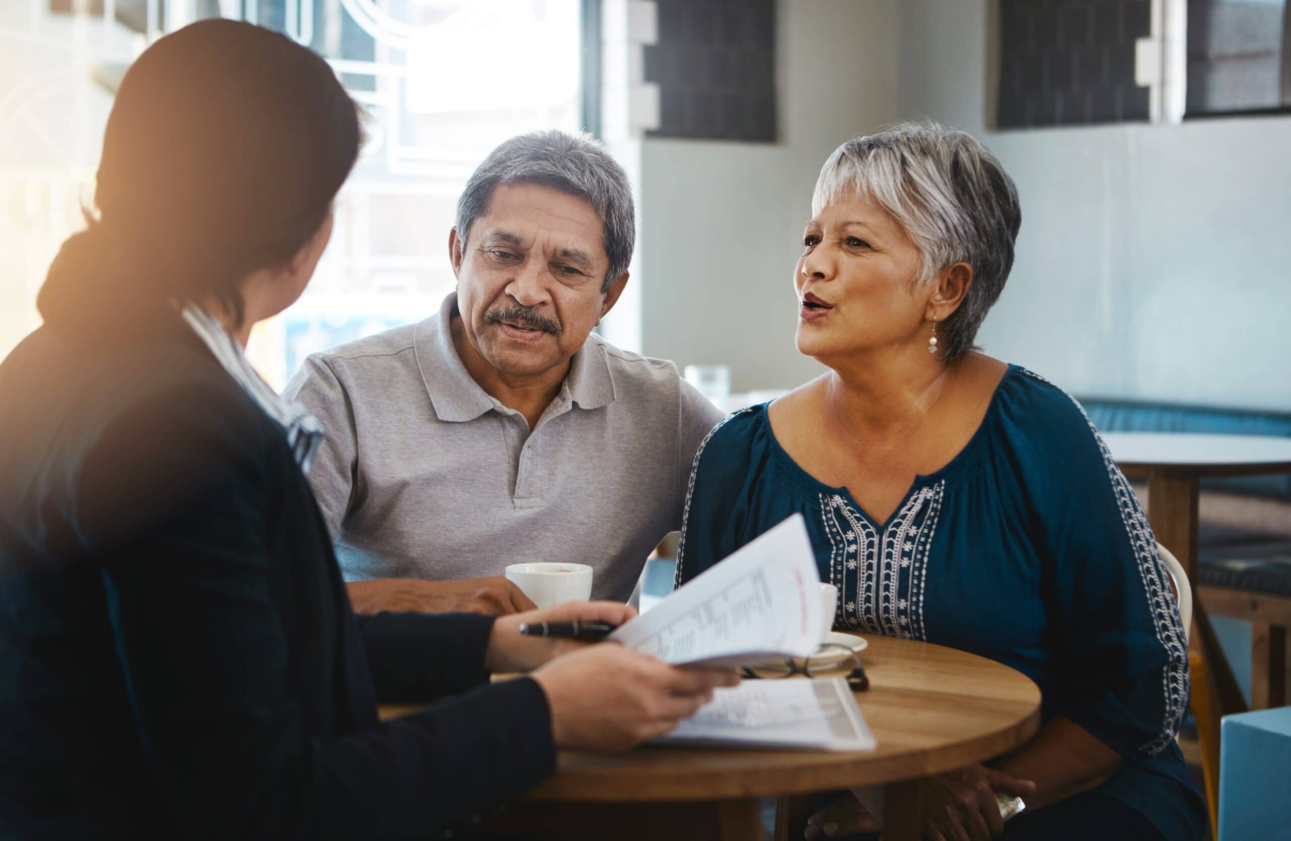 Senior couple meeting with a financial professional
