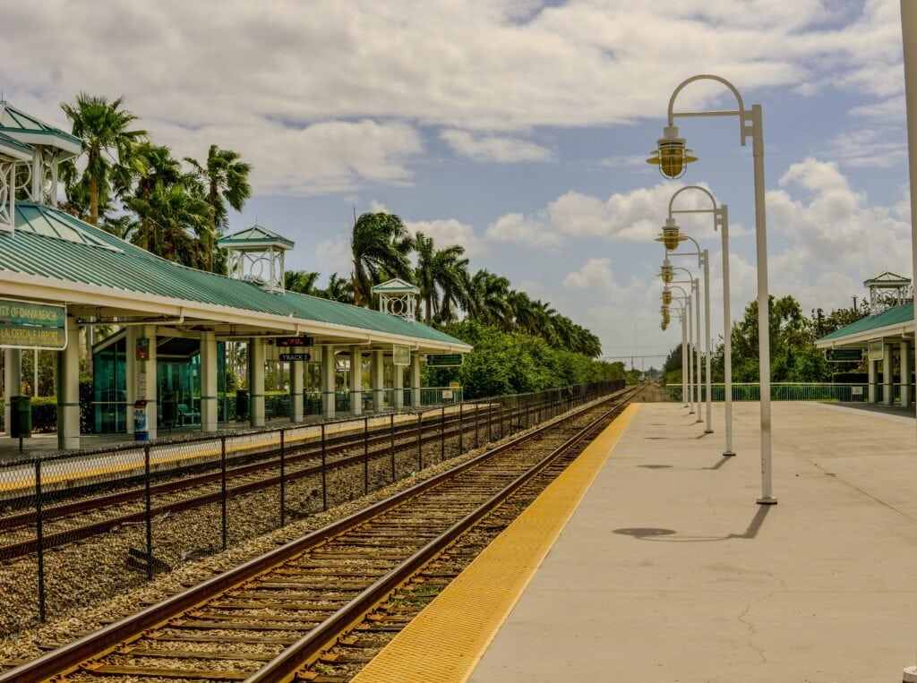 Florida train station passing through a small-town railroad tracks. A dependable surface mode of transportation for consumers.