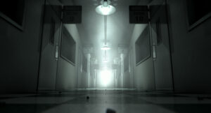 An eerie haunted look down the dimly lit passage of a dilapidated mental asylum with rooms and signs